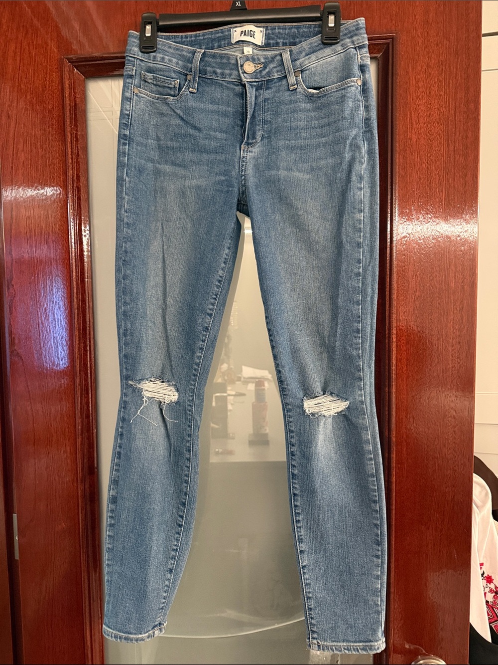 PAIGE Skinny Jeans in Medium Blue Wash with Knee Distress